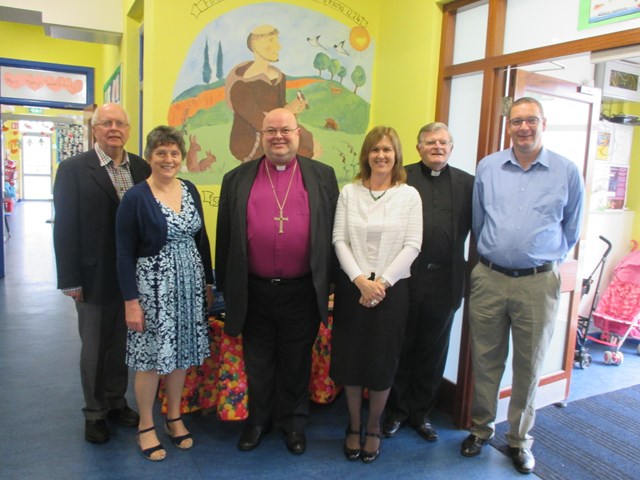 Members of the Board of Management and school staff welcome the Bishop to South Abbey National School.